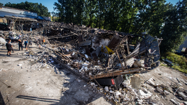 As Trump heads to Europe, Russian drones hit Kyiv and Zelenskyy urges sanctions