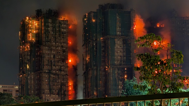 At least 13 dead as massive fire engulfs Hong Kong high-rise apartment buildings