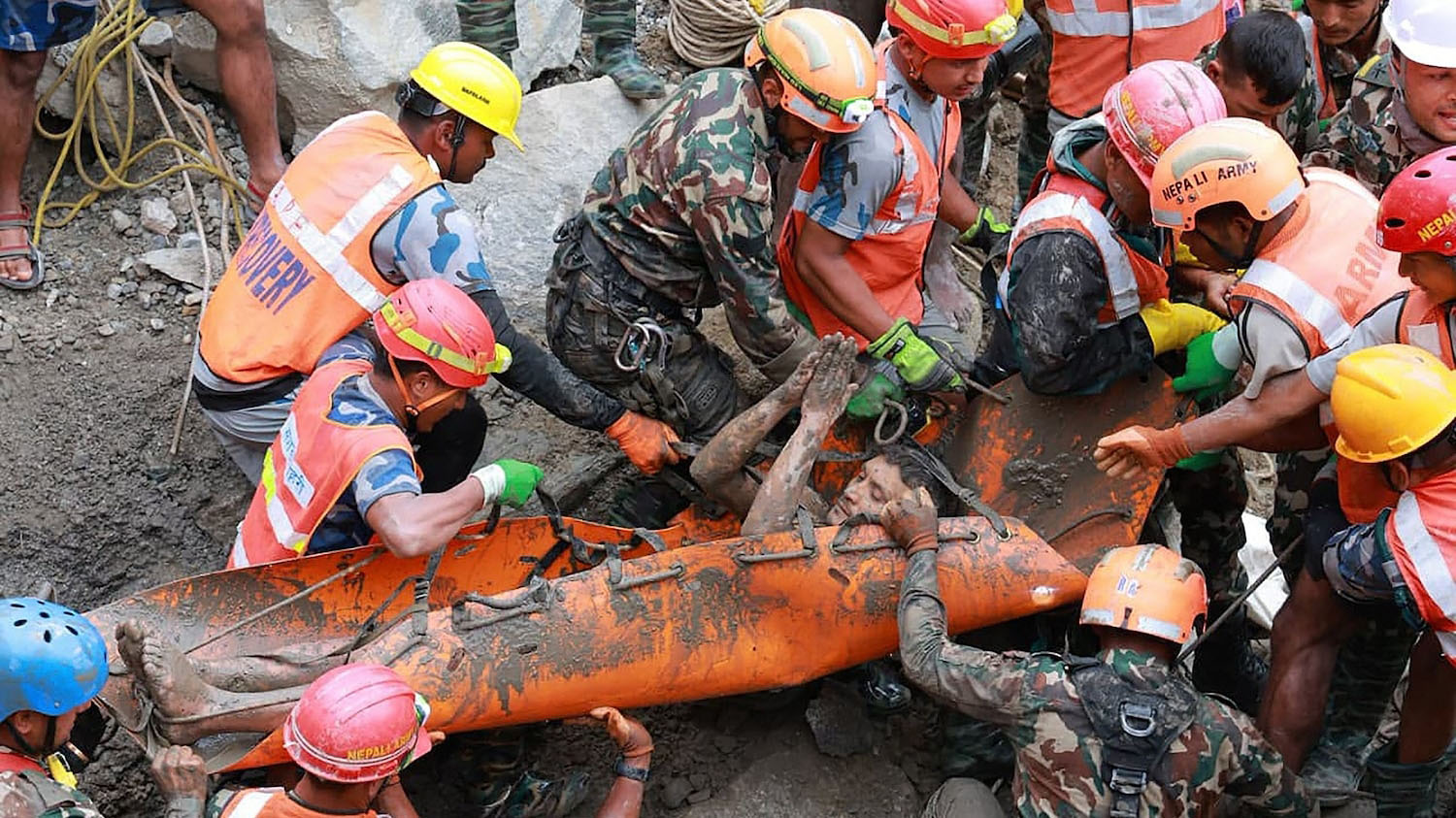 2 people rescued alive from tunnel after deadly Nepal-Tibet flash flood